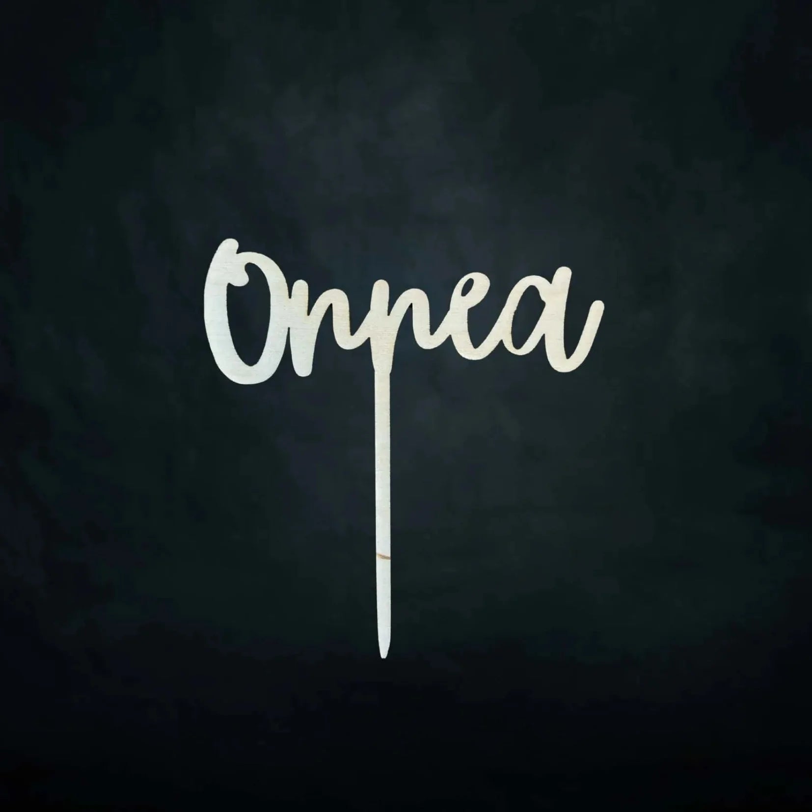 Puinen Onnea-kakkukoriste