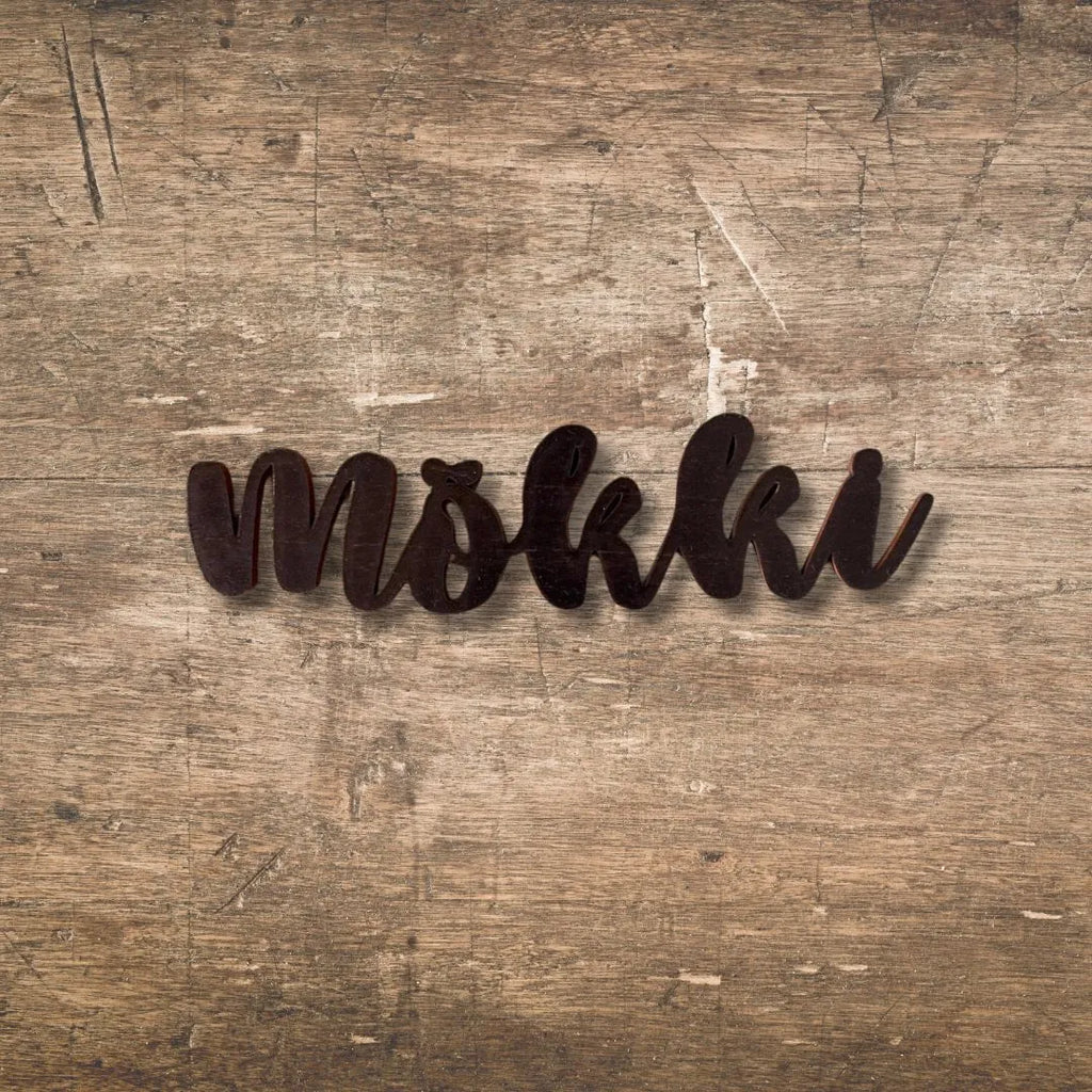 Puinen mökki-kyltti