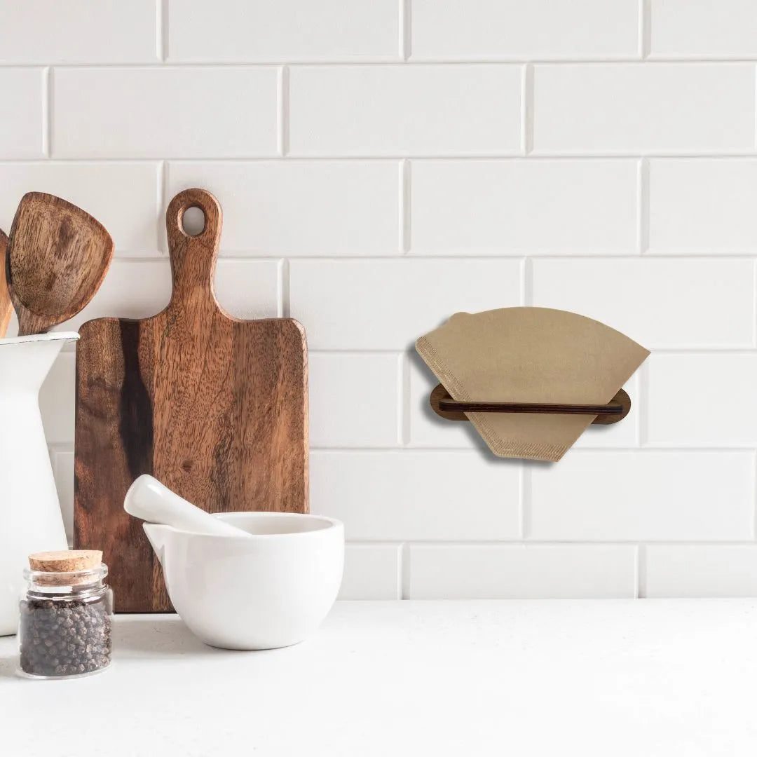 Seinään kiinnitettävä suodatinpussiteline