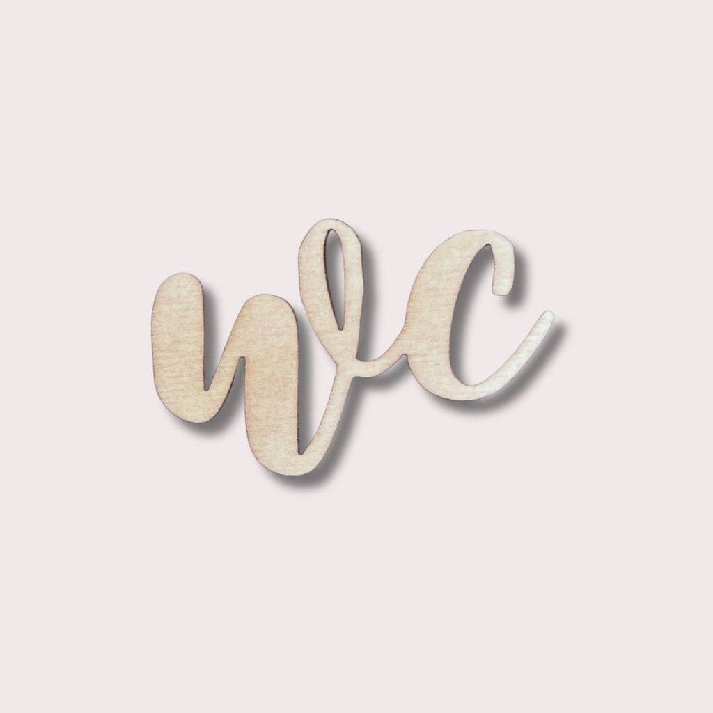 Puinen WC-kyltti
