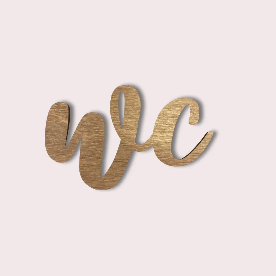 Puinen WC-kyltti