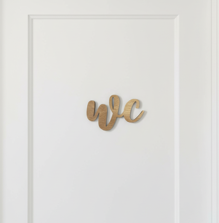 Puinen WC-kyltti